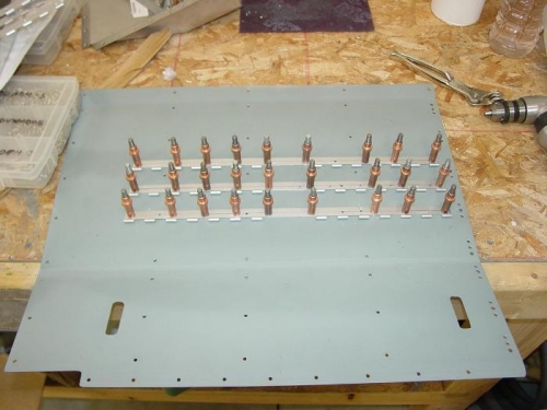 Here are the hinges  clecoed to the seat pans.