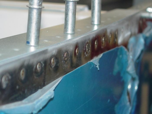Closer shot of the side rivits by the center fuselage.