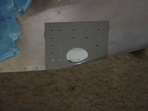 Primed a section of the fuselage for the step to mount to.