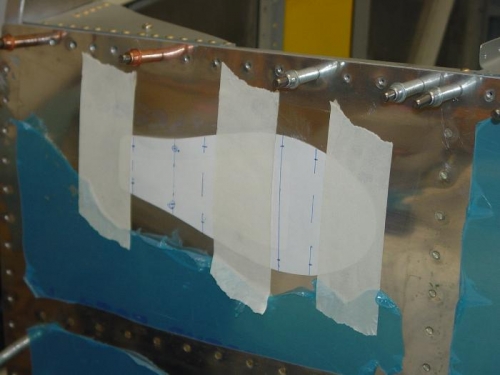 I have laid a templet on the outside of the fuselage.