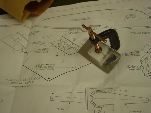 The pivot bracket matched drilled to the manual trim bracket.