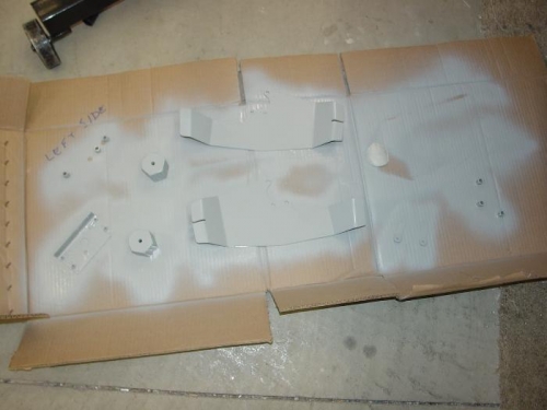 Primed  main landing gear parts.