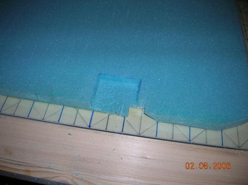 carved square hole in foam