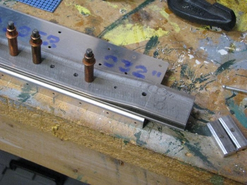 Drilling the bar doublers.