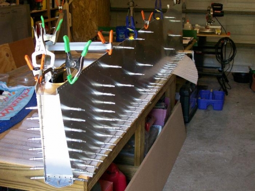 Side skin drilled to bottom longeron