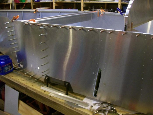 Side skins going into place