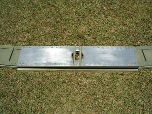 Center spar with bolt pattern visible