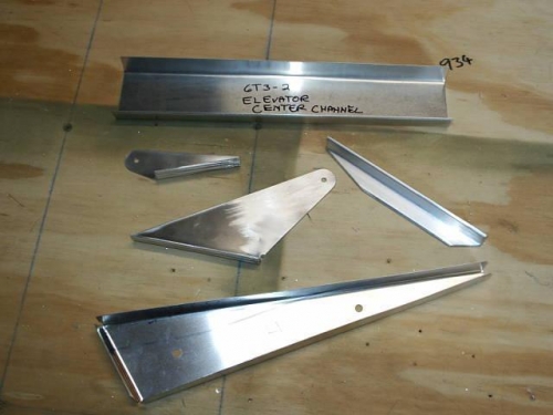 Assorted elevator parts including control horns