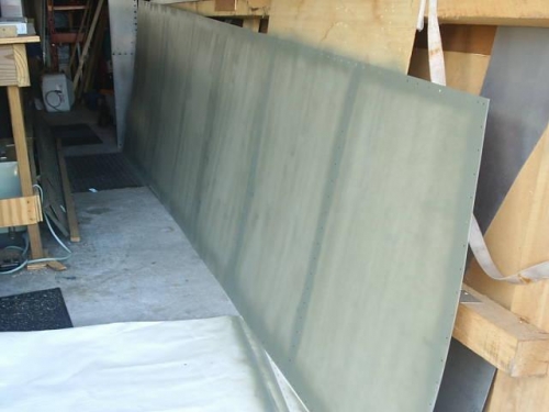 Top wing skin fogged w/zinc chromate