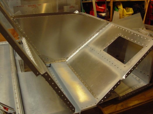 The passenger seat riveted in place