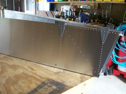 Left rear fuselage riveted