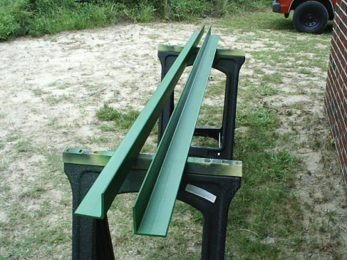 8' brake being painted John Deere green