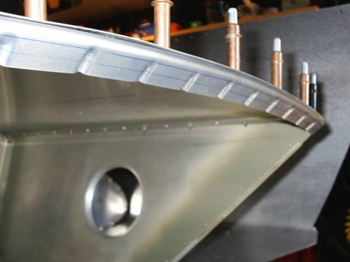 Flange showing tangent line and rivet line