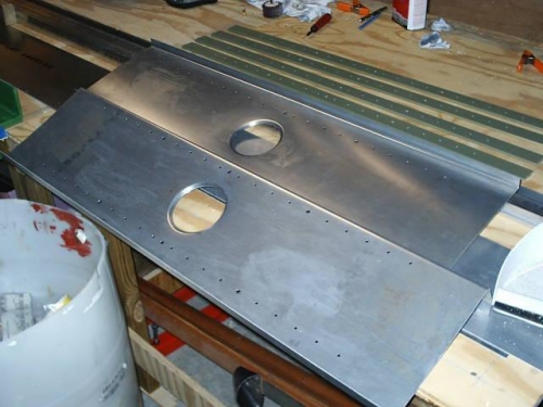 Center spar webs drilled