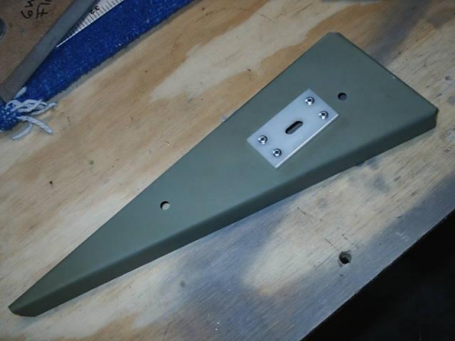 Flap control rod reinforcement for rib #1