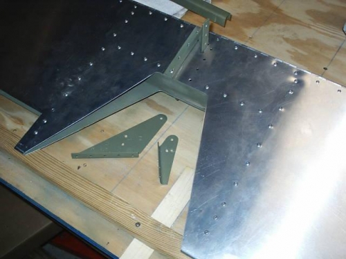 Drilled and replaced center area rivets