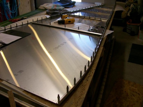 Left longeron bent to match bottom skin