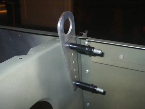 Tie down clecoed in place