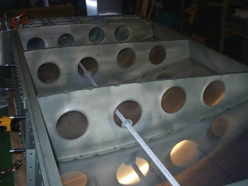 Conduit run through wing