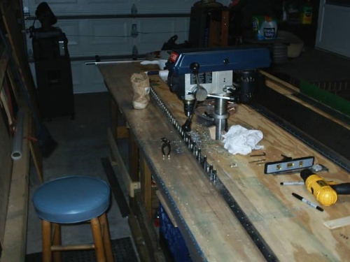 Drilling stacked caps and doublers