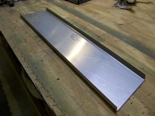 The rudder pedals rest on this channel