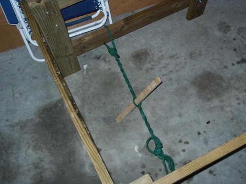 Using a Spanish windlass to bring the legs into alignment. Old world tech for sure.