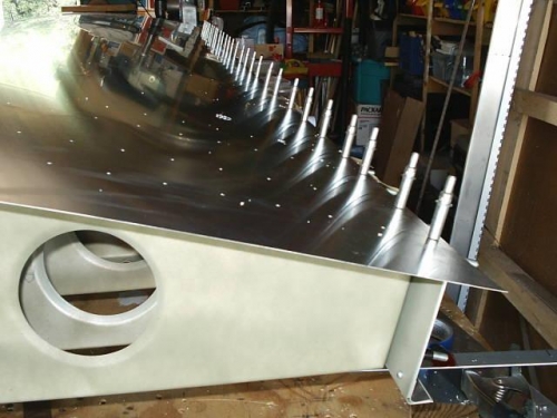 Pilot holes in rear channel