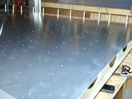 Pilot holes in top skin