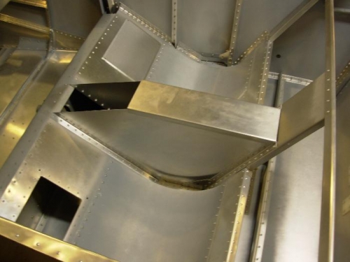 Curved seat pans in place