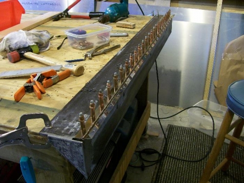 Drilling the steel hinge