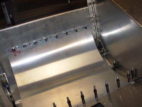 Passenger side seat bottom