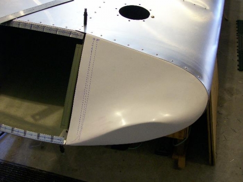 Tip riveted in place