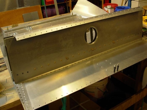 Side gussets riveted in