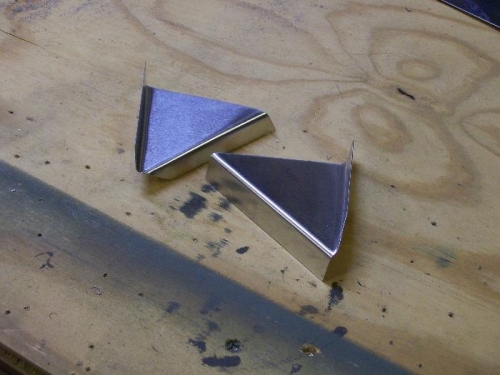 Gussets that help hold tubing in place