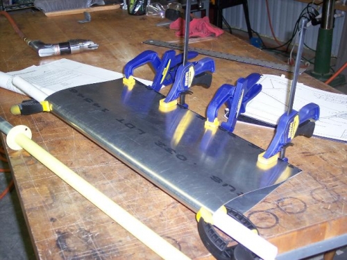Using a plastic pipe to form the bend