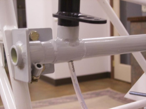 Hole drilled and tube installed in collective for wiring