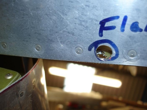 Opened up the rivet hole in the bottom