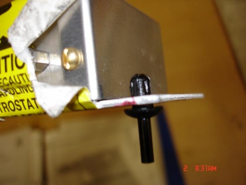 I used these plastic drive rivets to secure the unit to the tray