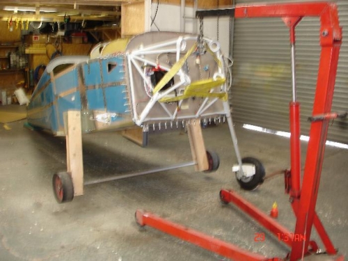 Used the engine hoist to lift the fuse