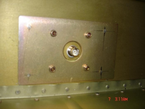 I fit the com in the out board bay under the pilots seat