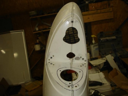 Riveted the nut plates and opened out the fibreglass