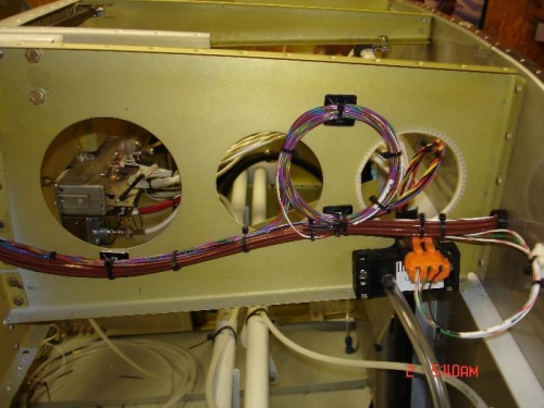 Ran the D120 ems harness through the firewall and coiled and stowed the unused the spare inputs,