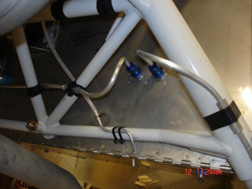 I found it simpler to run the brake pipes down the front of the leggs