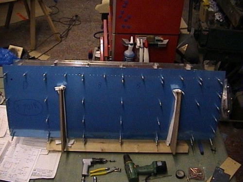 Fuel tank components clecoed together