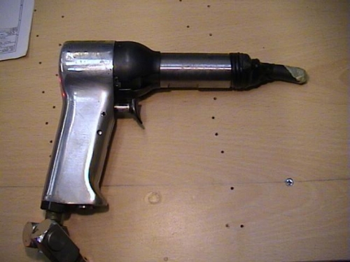 Gun adapted for the confines of the leading edges