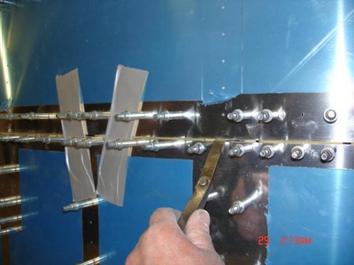 Checking the gap between the canopy skin and forward top skin