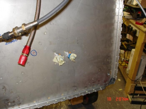 Its a breeze riveting the hinges on with the engine and mount removed