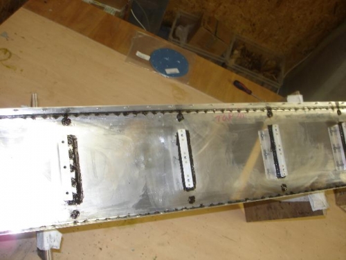 Used the left over sealant to cover the rivets