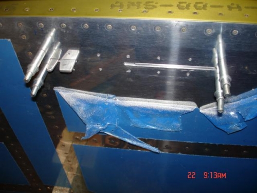 Latch mechanism drilled and clecoed in place