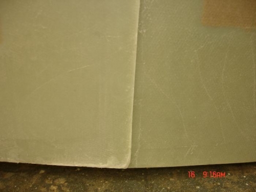 Allowing the sides to overlap at the rear